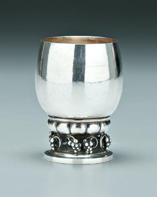 Appraisal: Georg Jensen sterling beaker round with pendant grapes on base