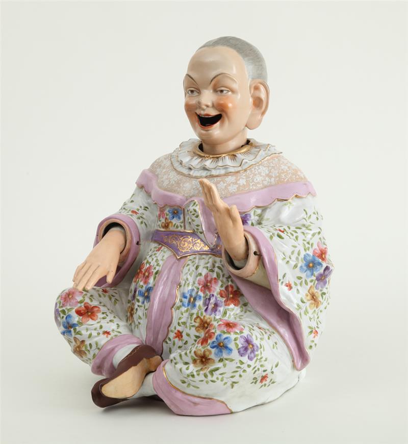 Appraisal: CONTINENTAL PORCELAIN NODDING HEAD FIGURE IN THE MANNER OF MEISSEN