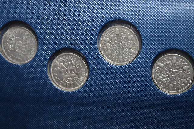 Appraisal: THREE ALBUMS OF COINS including pennies halfpennies farthings and silver