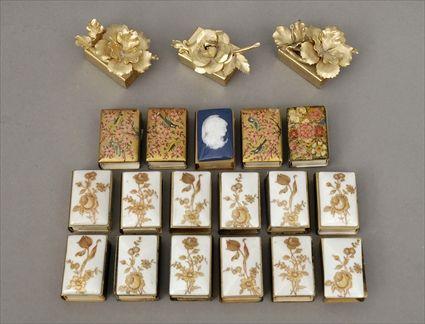 Appraisal: Eighteen Gilt-Metal Porcelain-Mounted Gilt-Metal and Papier-M ch Mounted Gilt-Metal Matchbox