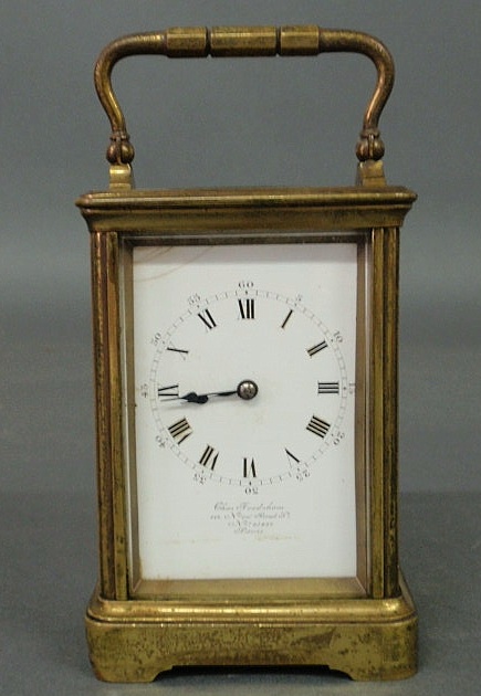 Appraisal: French brass carriage clock with beveled glass face signed Chas