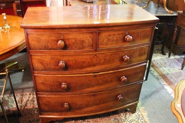 Appraisal: A TH CENTURY MAHOGANY BOW FRONT CHEST of two short