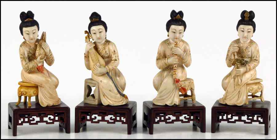 Appraisal: SET OF FOUR CHINESE POLYCHROME CARVED IVORY FIGURES OF MUSICIANS