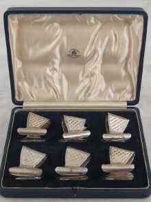 Appraisal: A boxed set of six silver Art Deco asparagus eaters