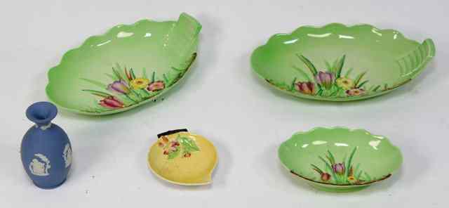 Appraisal: A pair of Carlton Ware leaf shaped dishes moulded flowers