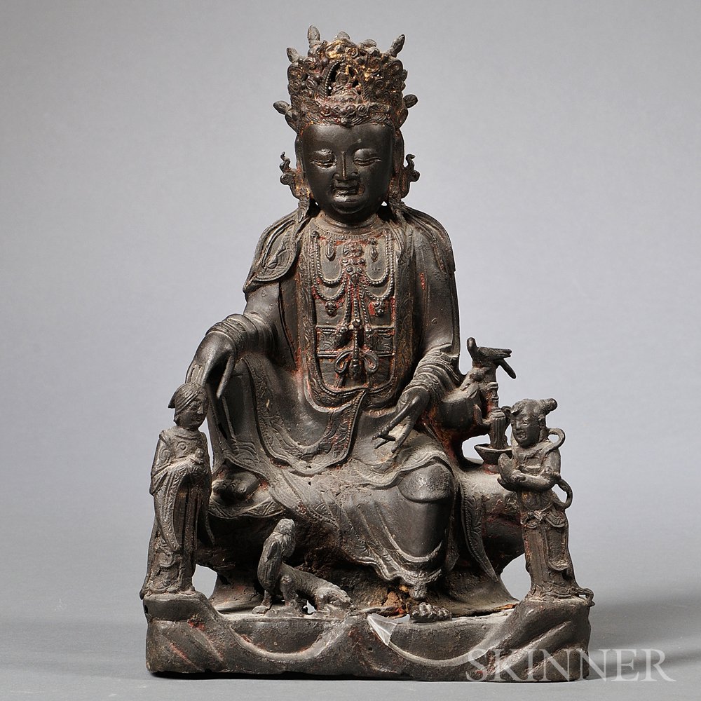 Appraisal: Bronze Figure of Guanyin China th century seated in a