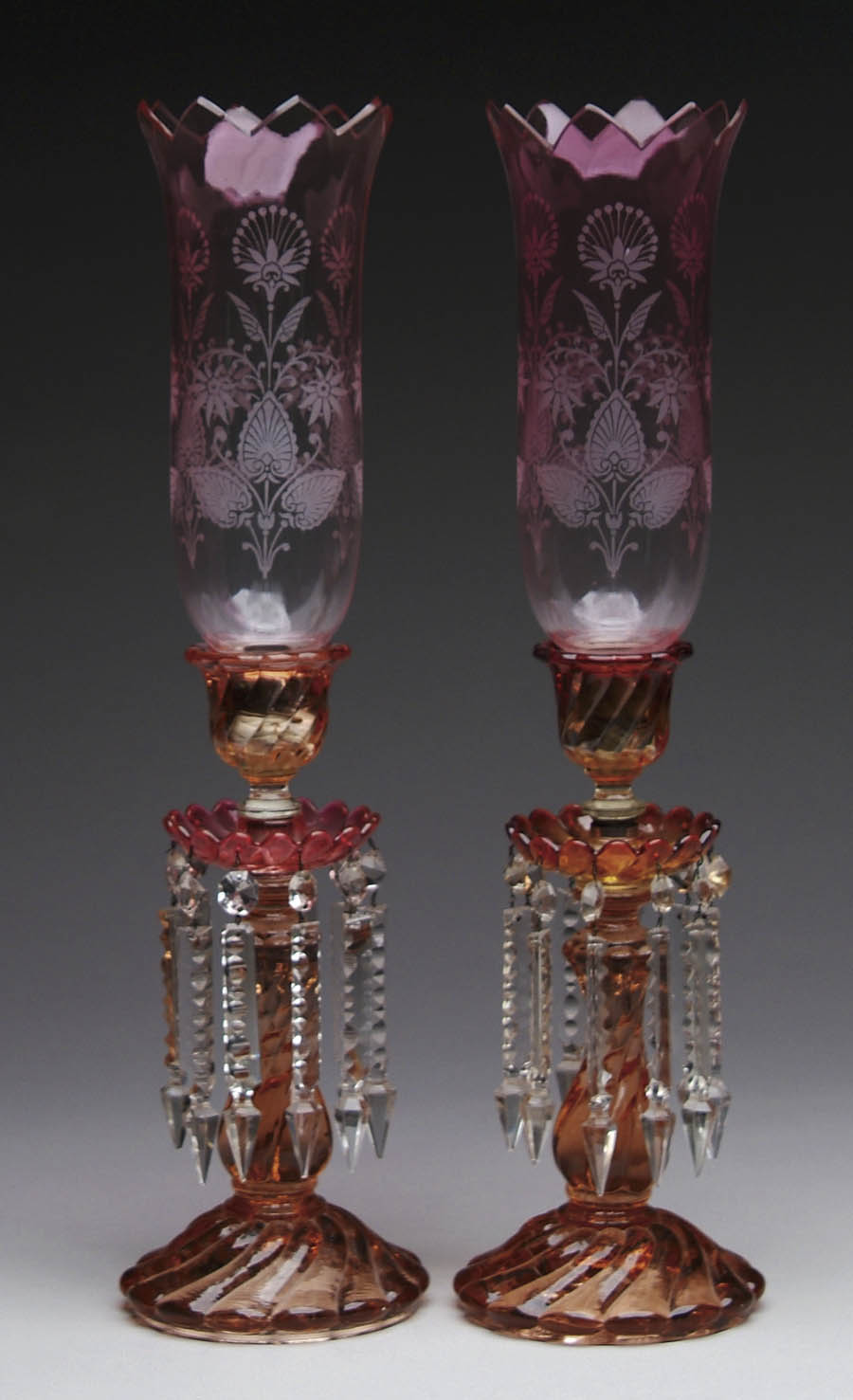 Appraisal: PAIR OF GLASS CANDLESTICKS Beautiful pair of salmon colored glass