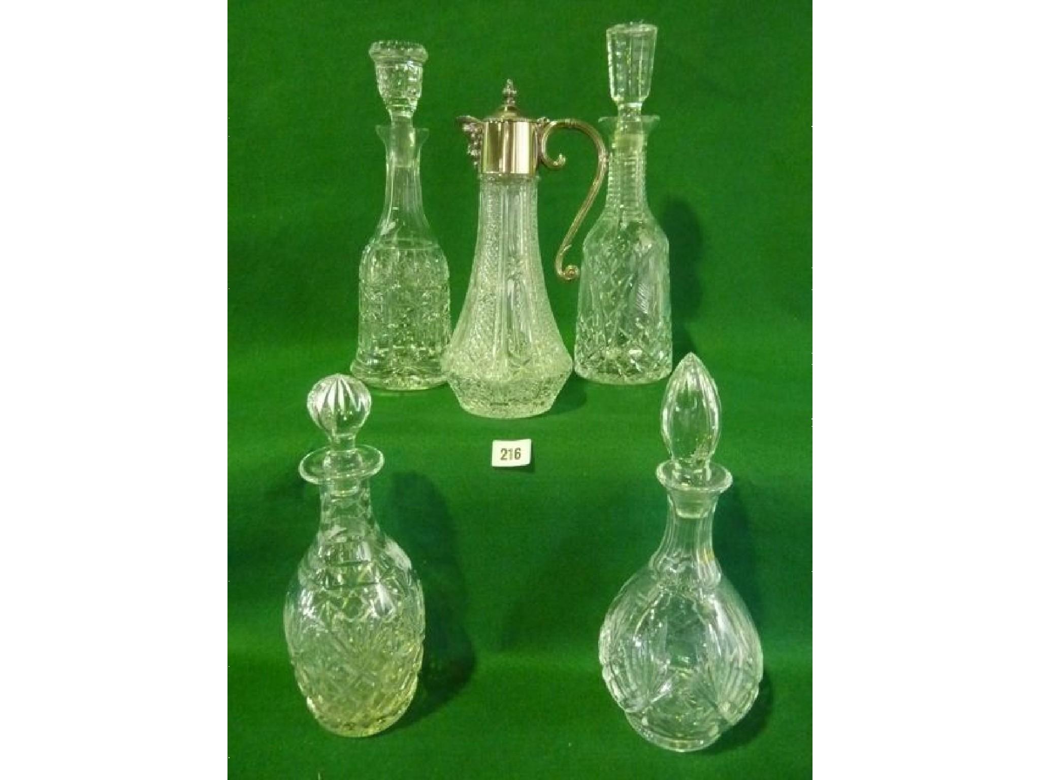 Appraisal: A collection of five crystal and other decanters including Royal