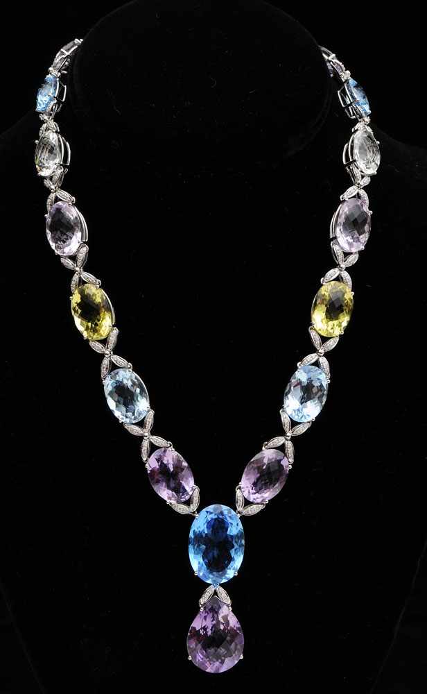 Appraisal: K WHITE GOLD COLORED STONE AND DIAMOND NECKLACE in