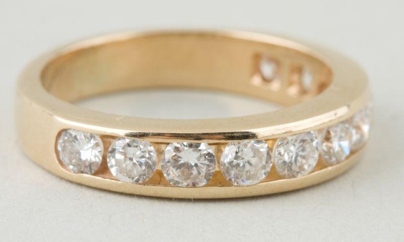 Appraisal: KT Yellow Gold Diamond Wedding Band with round brilliant cut