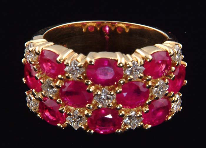 Appraisal: DIAMOND RUBY AND K YELLOW GOLD LADY S RING The