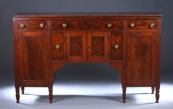 Appraisal: AMERICAN LATE FEDERAL MAHOGANY SIDEBOARD early th century Three drawer