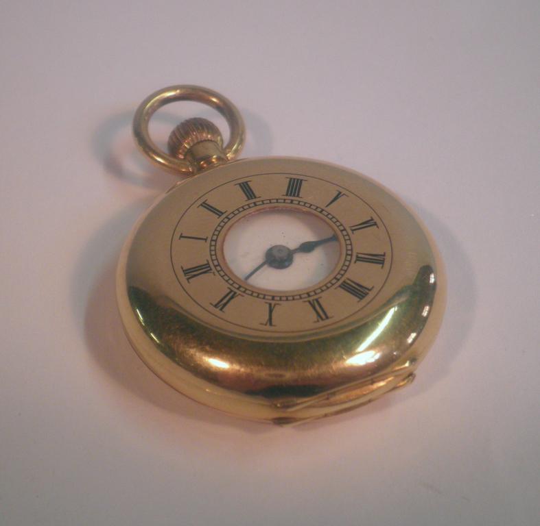 Appraisal: An ct gold cased small size half hunter fob watch