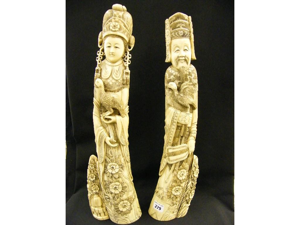 Appraisal: Pair of early th century Oriental carved ivory tusks modelled