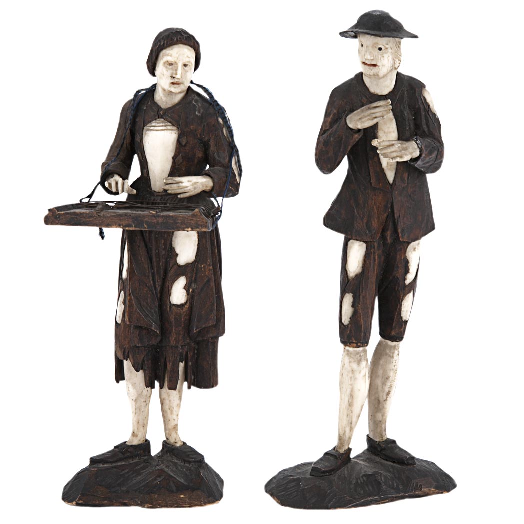 Appraisal: Two German Ivory and Boxwood Figures In the manner of