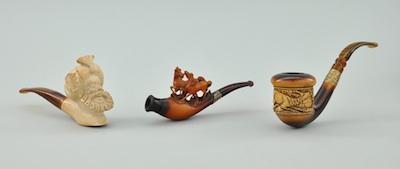 Appraisal: A Group of Three Carved Smoking Pipes German Containing three