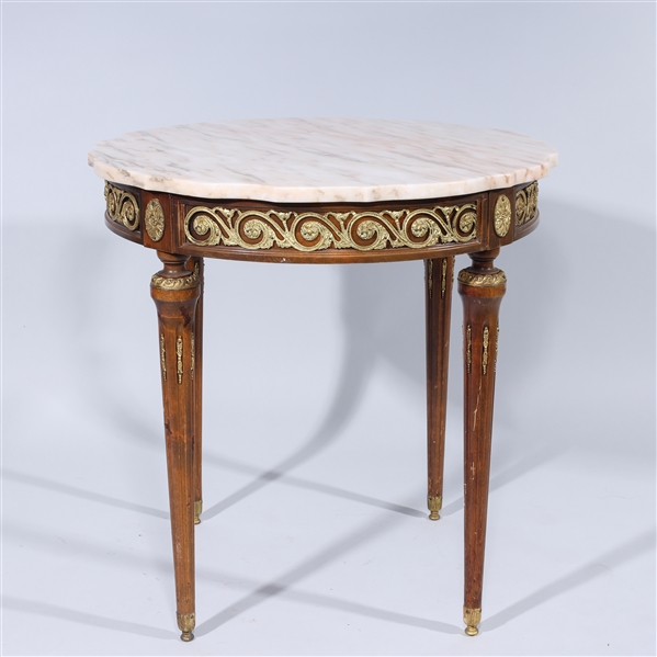 Appraisal: Spanish metal and wood table with marble top French style