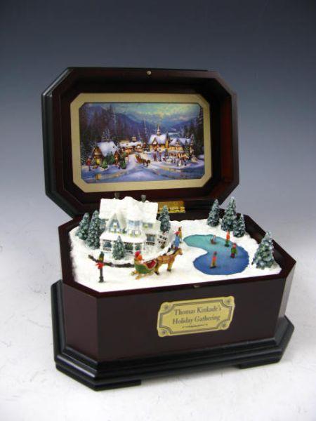 Appraisal: Thomas Kinkade Music Box Holiday Gathering mahogany case x x