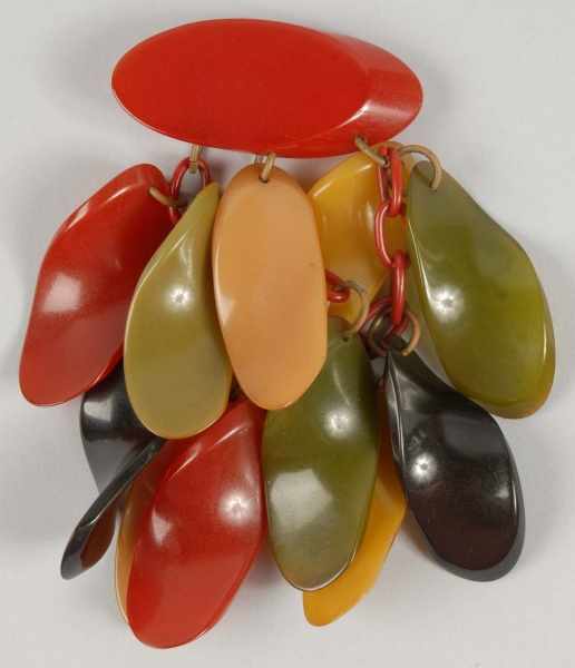 Appraisal: Bakelite Pin with Dangling Pieces Condition Excellent Size - x