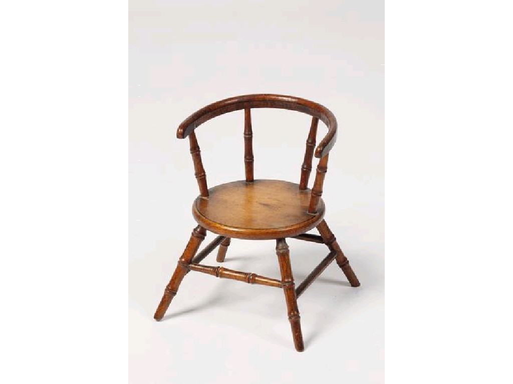 Appraisal: A MINIATURE WINDSOR CHAIR with a curved back rail four