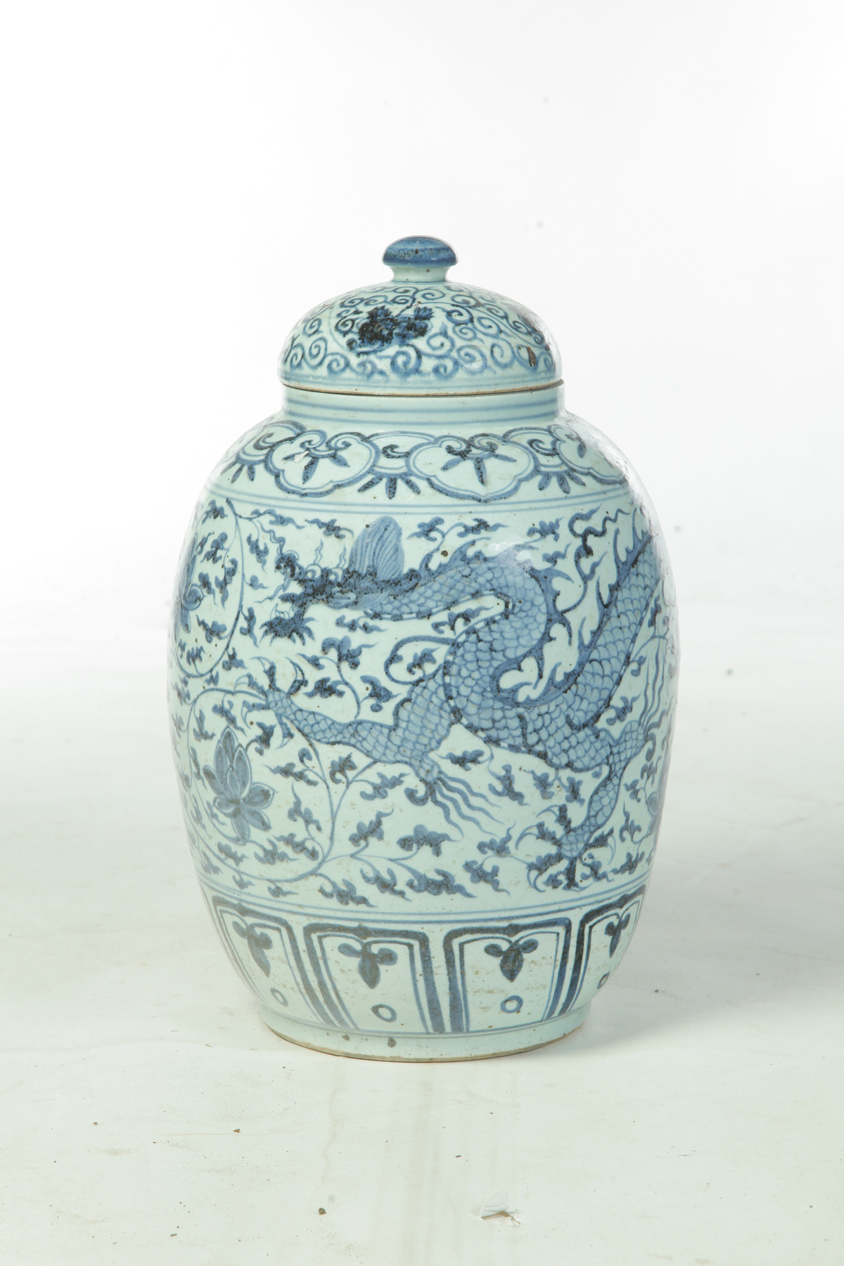 Appraisal: CHINESE CERAMIC COVERED URN Twentieth century Hand decorated with blue