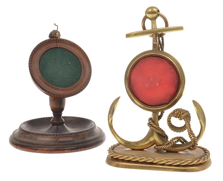 Appraisal: TWO ANTIQUE NOVELTY FOB WATCH STANDS one of cast brass