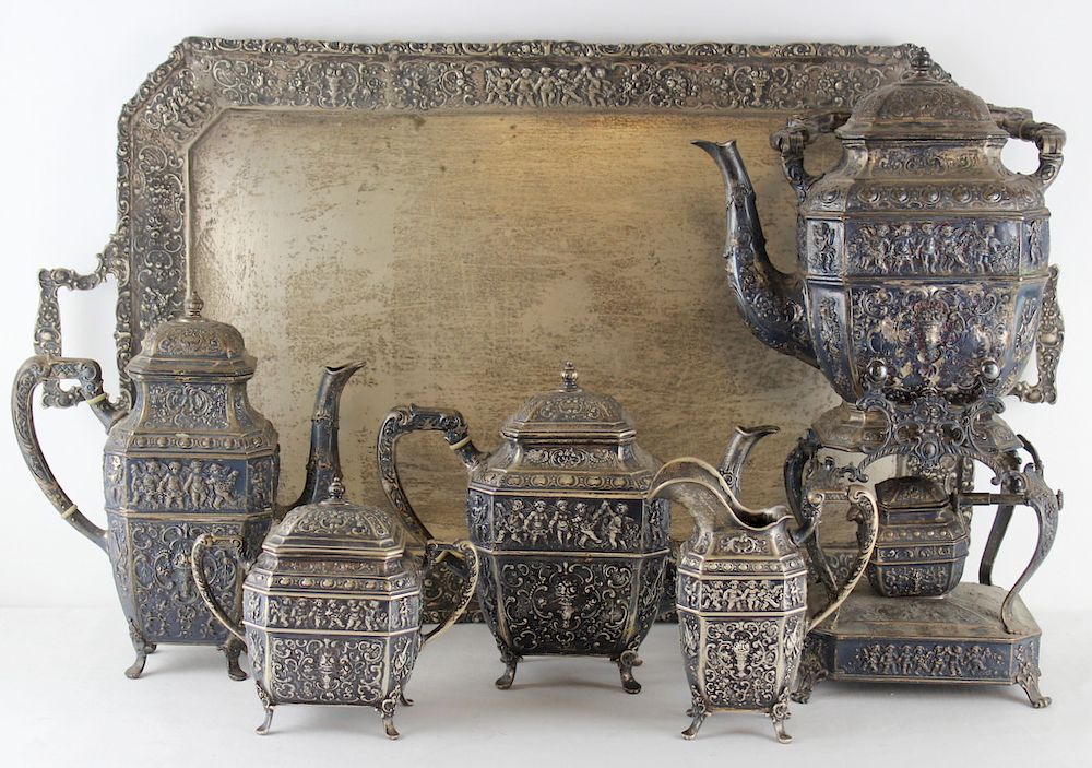 Appraisal: STERLING German Repousse Pc Tea Service Tray German sterling tea