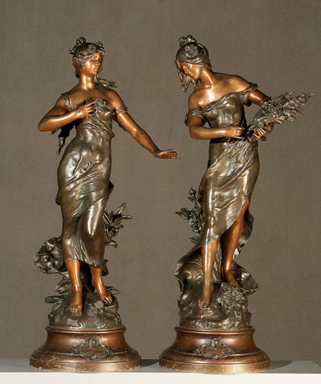 Appraisal: Pair of French Parcel Gilt and Brown Patinated Spelter Figures