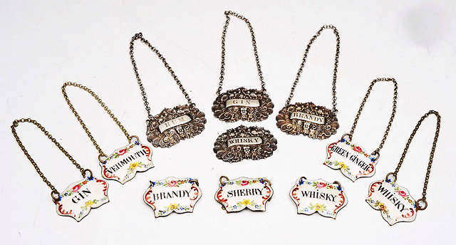 Appraisal: A SET OF FOUR WILLIAM IV SILVER WINE LABELS each