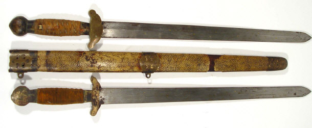 Appraisal: Two Chinese swords in a shagreen and brass scabbard cm