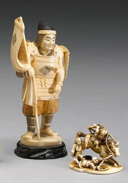 Appraisal: Two ivory figural carvings The first a small humorous Meiji