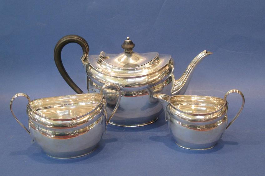 Appraisal: A THREE PIECE TEA SET of tapering oval form with