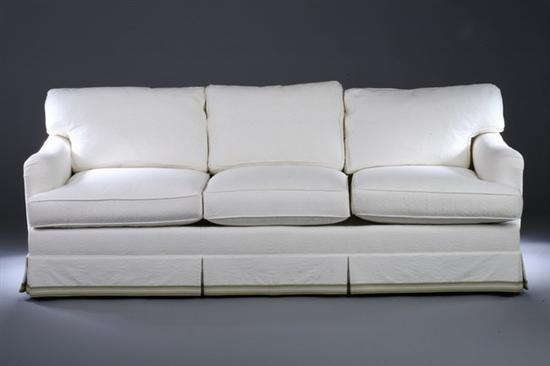 Appraisal: TRADITIONAL BOX-FORM SOFA Late th century Rist Corporation with cream