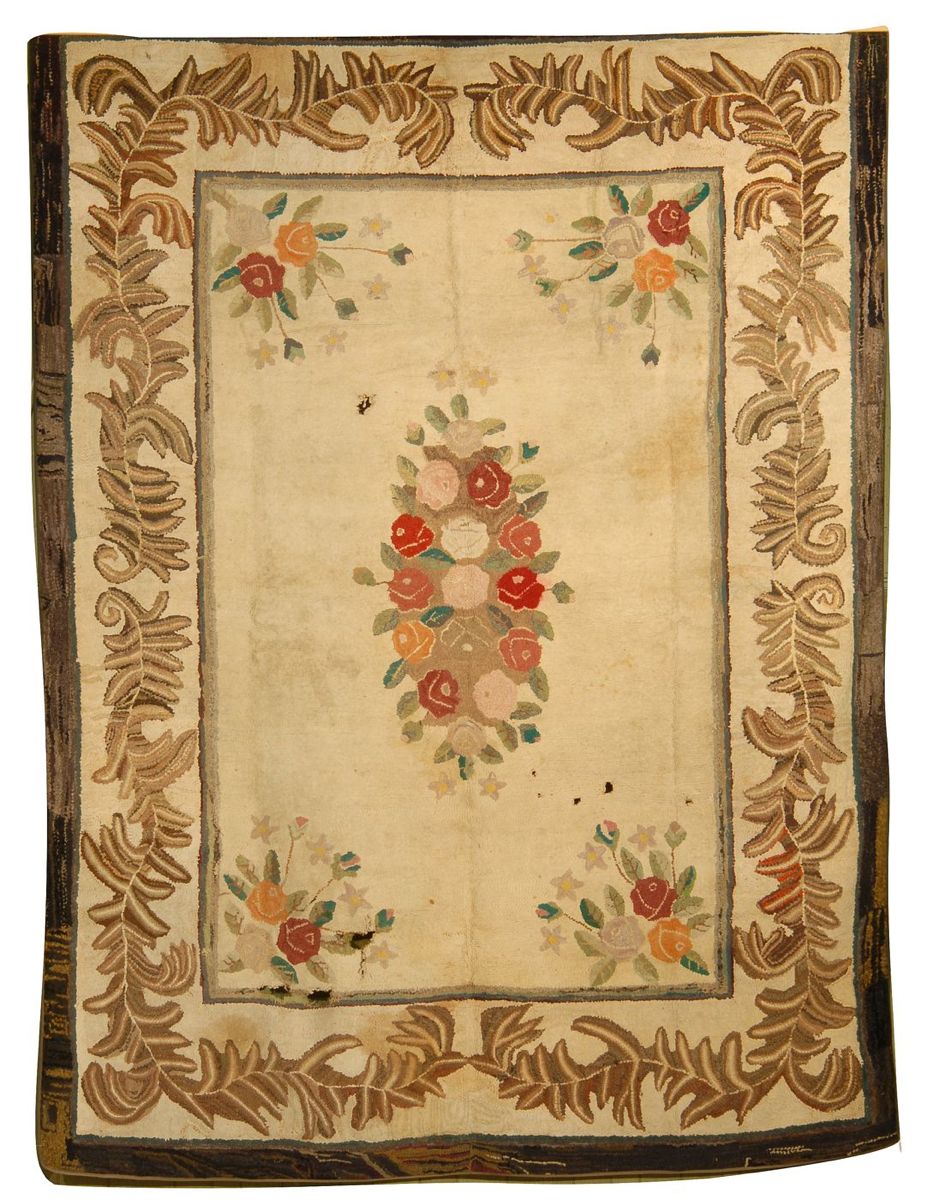 Appraisal: HOOKED RUG ' x ' Central bouquet of flowers in