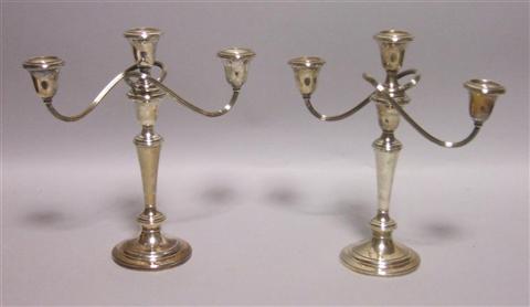 Appraisal: PAIR OF AMERICAN SILVER THREE LIGHT CANDELABRA In the simple