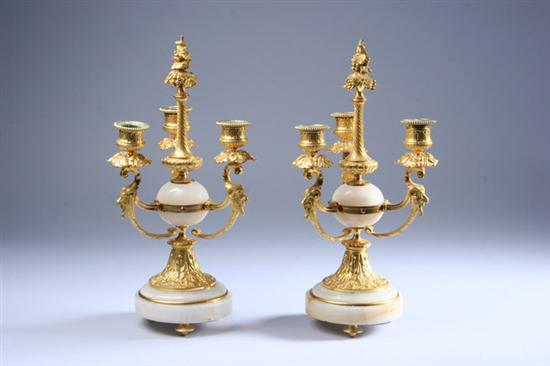 Appraisal: PAIR LOUIS XVI-STYLE BRONZE-DOR AND MARBLE THREE-LIGHT CANDELABRA th century