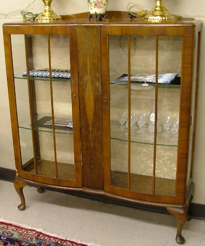 Appraisal: GLASS MAHOGANY AND WALNUT CHINA DISPLAY CABINET Queen Anne style