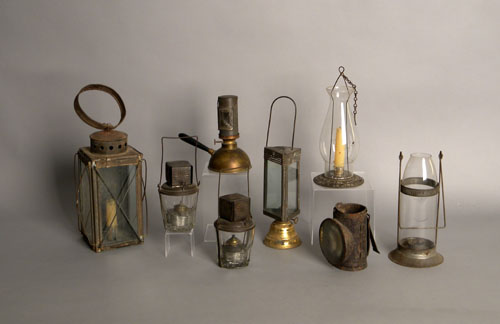 Appraisal: Two Star Tumbler lights together with a tin lantern two