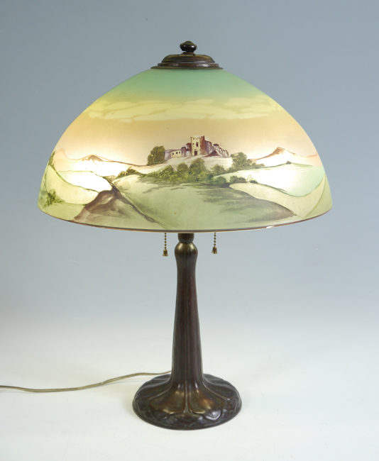 Appraisal: REVERSE PAINTED TABLE LAMP Attributed to Pittsburg bronze base with