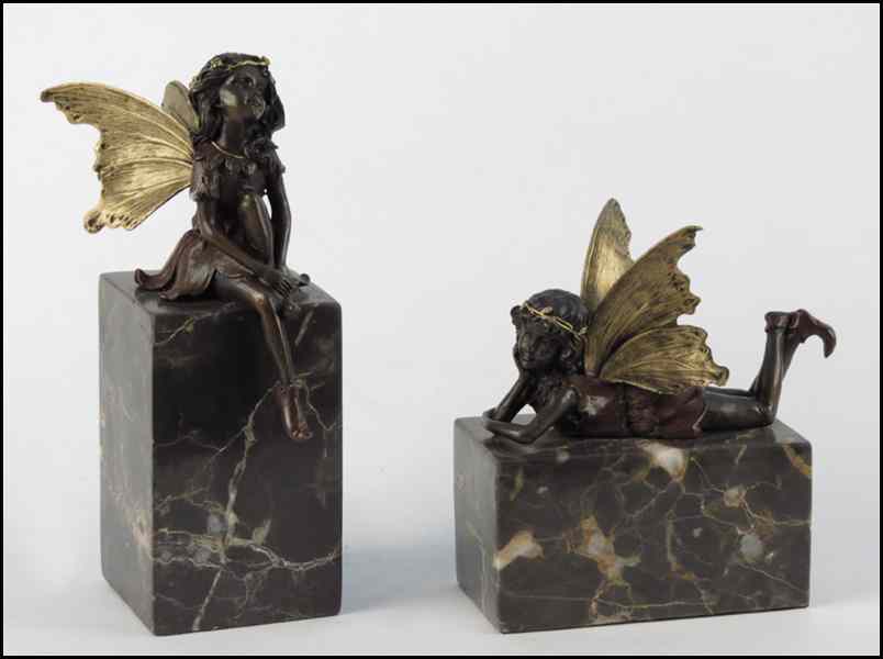 Appraisal: TWO PAINTED BRONZE FAIRY FIGURES Height '' raised on a