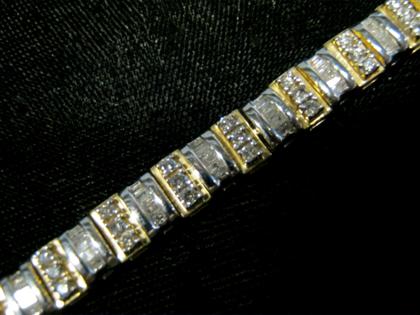 Appraisal: karat white and yellow gold diamond braceletAlternating white and yellow