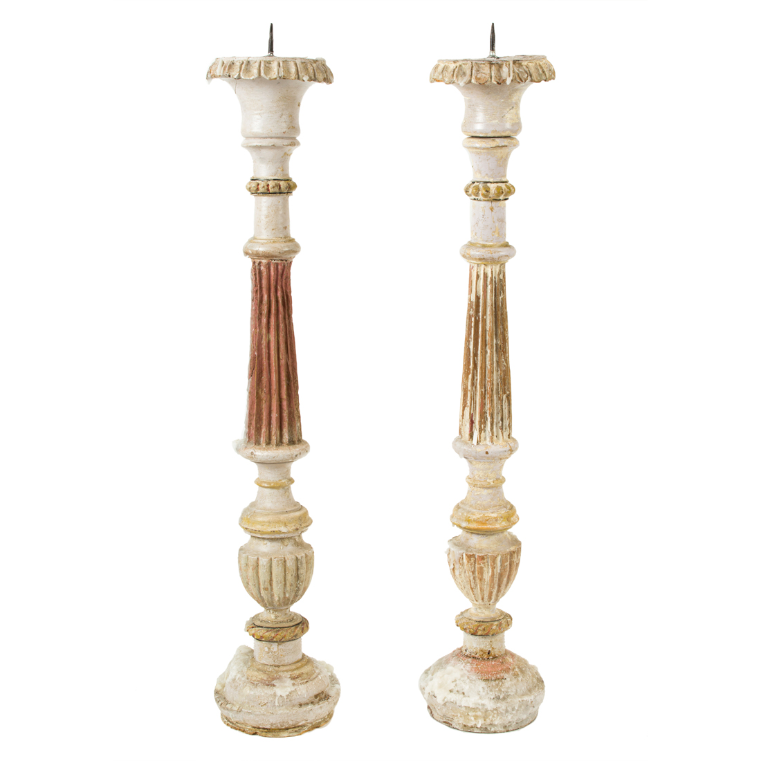 Appraisal: A pair of partial paint decorated columnar candle prickets in