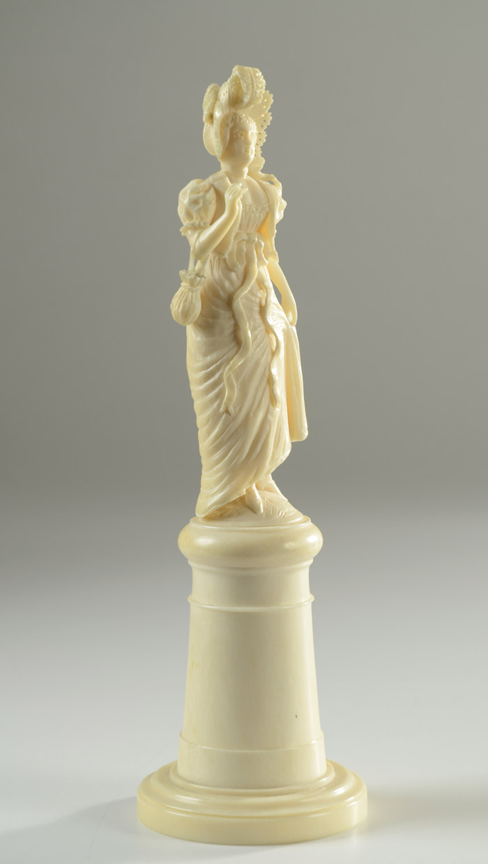 Appraisal: VICTORIAN IVORY CARVED FIGURE of woman in long period dress