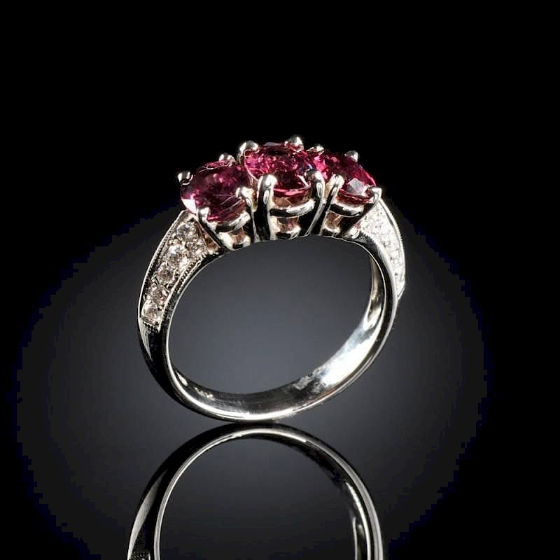 Appraisal: A K K WHITE GOLD RUBY AND DIAMOND LADY'S RING