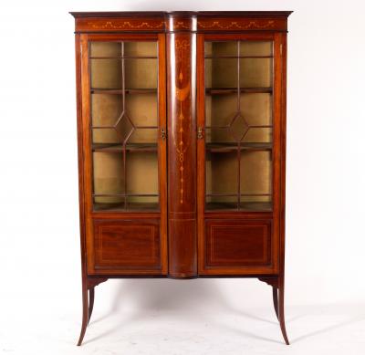 Appraisal: An Edwardian mahogany and inlaid display cabinet with glazed panel