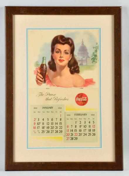 Appraisal: Coca-Cola Calendar Framed and matted under plexiglass A few small