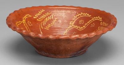 Appraisal: Slip-decorated redware bowl crimped rim slip-decorated interior with floral motifs