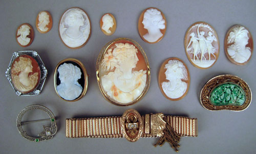 Appraisal: Two cameo pins loose cameos sterling and jade pin K