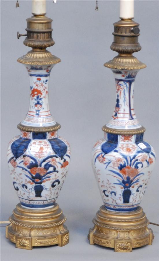 Appraisal: AN ANTIQUE PAIR OF IMARI VASES Mounted as lamps Each