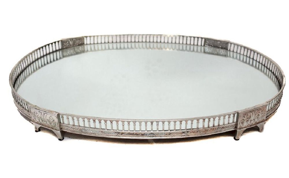 Appraisal: Silvered Oval Mirror Platform Plateau A pierced silver plate oval